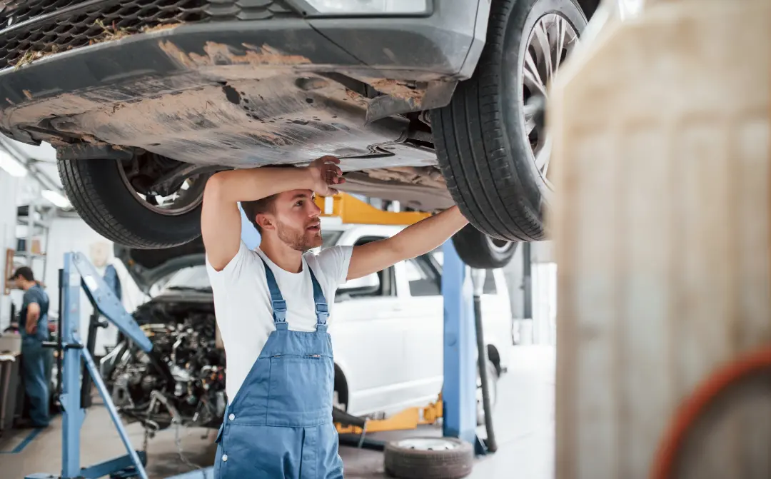 A mechanic road-testing a car after a service at All Vehicle Services